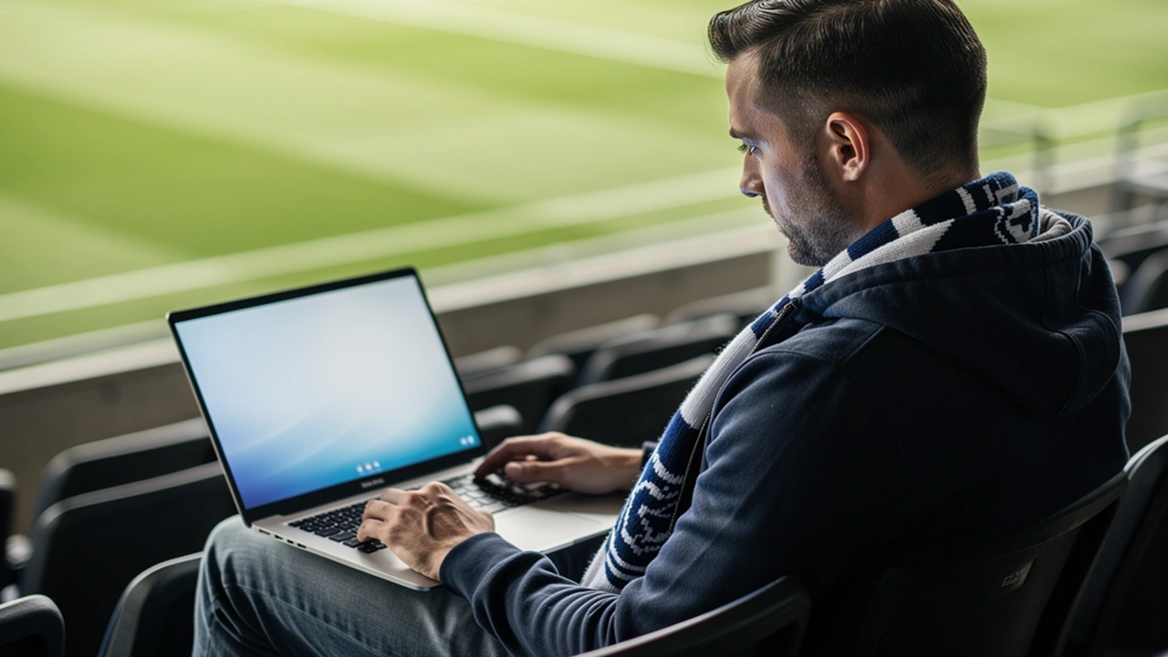 Voetbalfan die verschillende opties bekijkt op laptop met stadion achtergrond